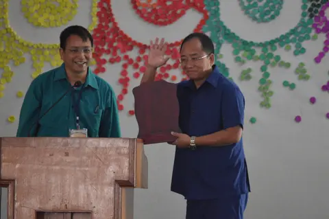 Hon'ble Parl. Secy UD, Housing, TP, MA & PWD Govt. of AP receiving memento from Ex- Youth President ABCC 